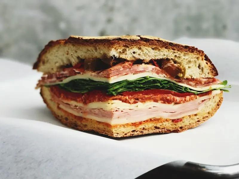 Triple-decker grilled chicken club sandwich with bacon
