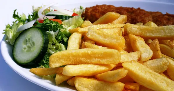 Battered haddock with fries and coleslaw